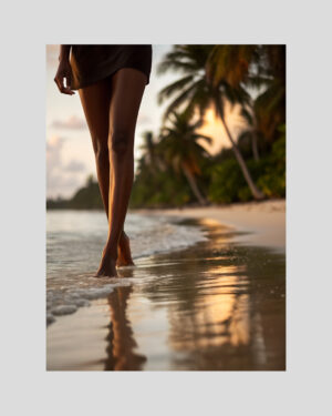 Affiche d’une femme marchant pieds nus sur la plage de Deshaies en Guadeloupe au coucher du soleil